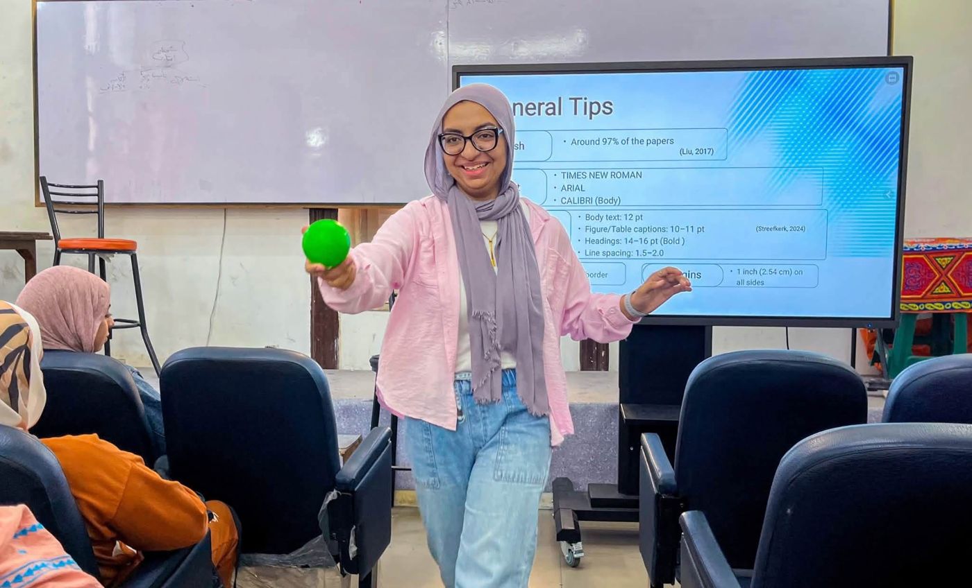 A lecturer presenting with a smart screen